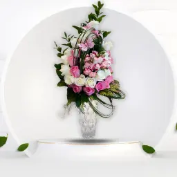 A Glass Vase With Natural Pink And White Roses